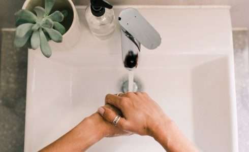 person washing hands