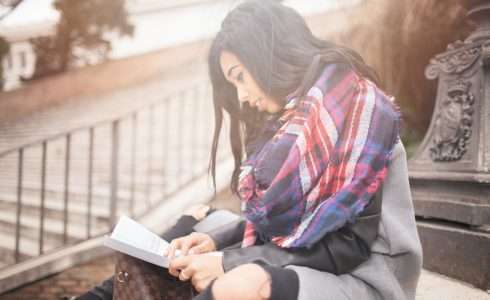 Woman Outside Looking Map