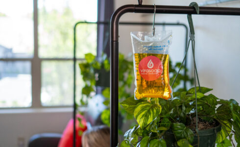 An IV infusion therapy bag with yellow vitamin fluid hangs at Virasoap Natural Medicine in Meridian Boise Idaho